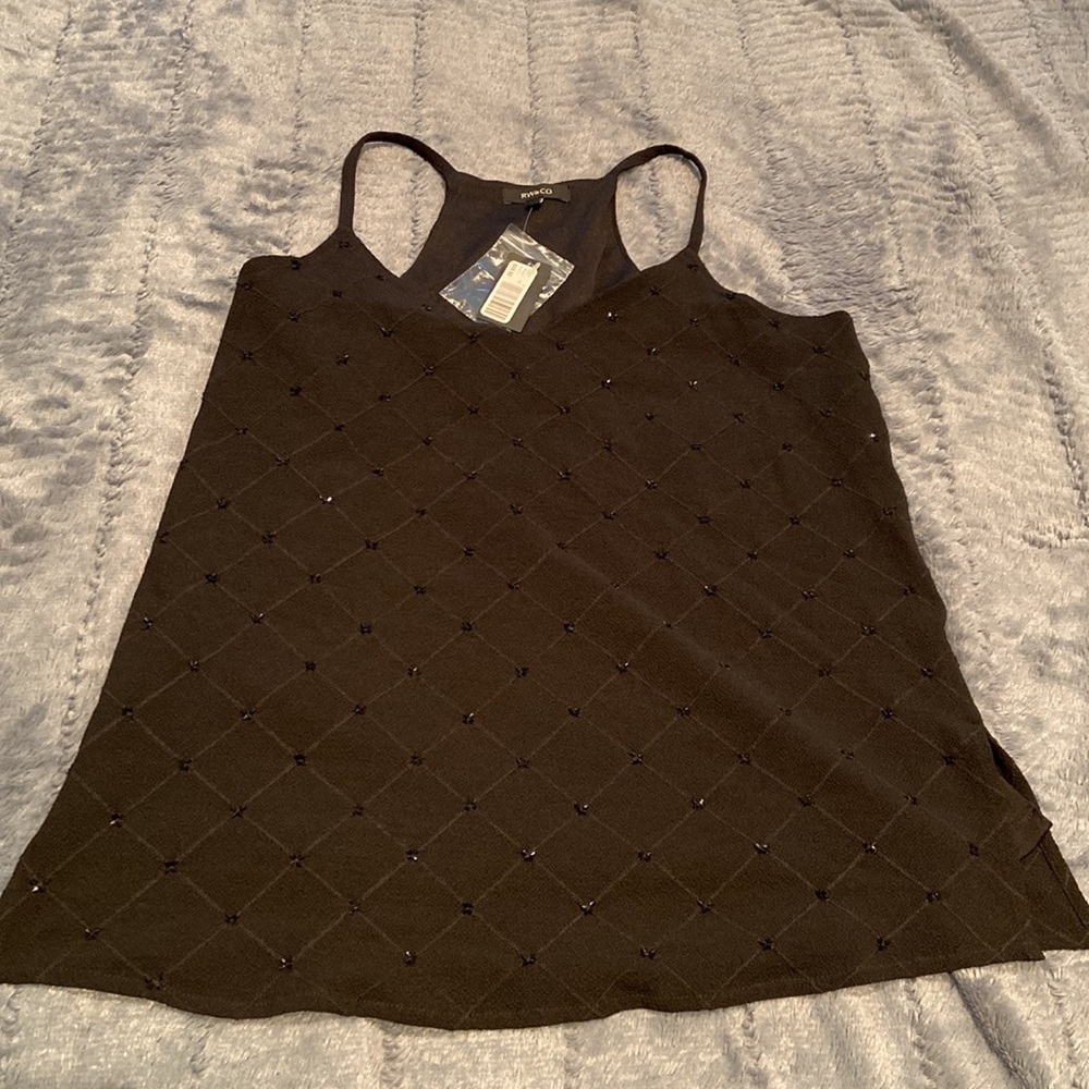 **NWT** Very pretty little black top with delicate sequins